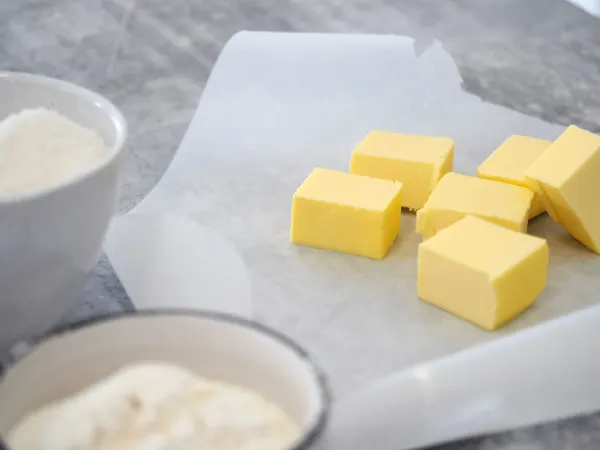 How much saturated fat per day with high cholesterol?