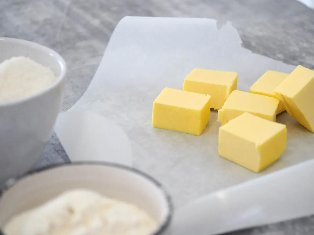How much saturated fat per day with high cholesterol?